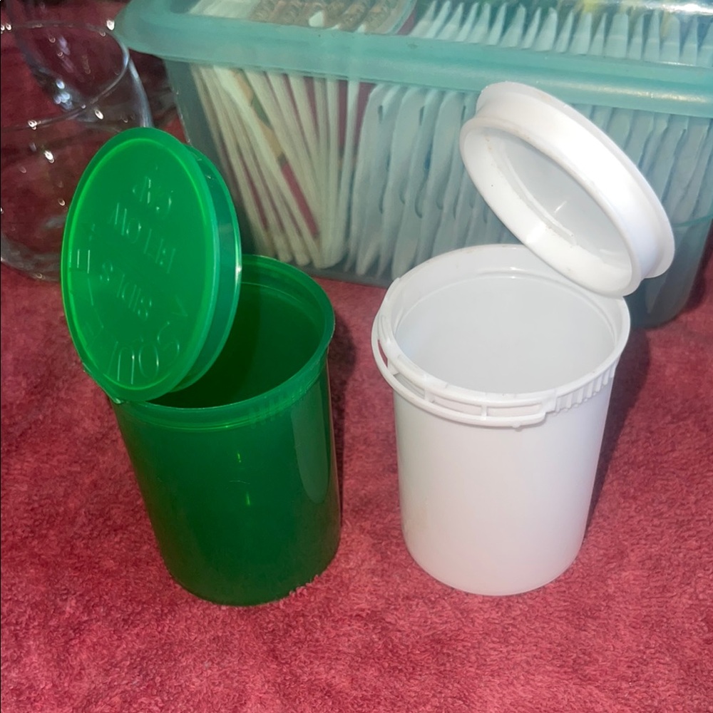 Green and White Plastic Containers